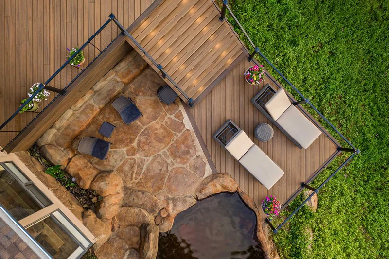 Deck with lighting, pergola and outdoor kitchen
